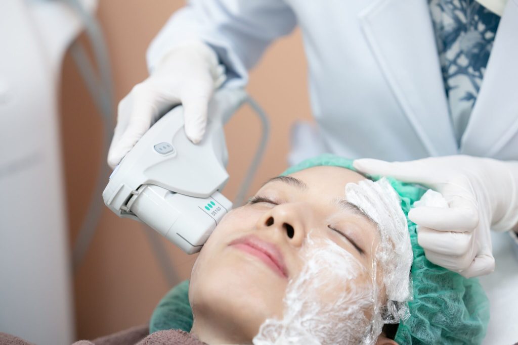 Woman receiving a facial treatment